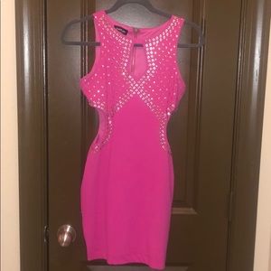 Pink curve hugging bebe dress